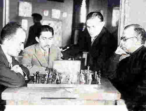 15.Tbilisi. Behind a chessboard - Ebralidze and Agamalyan Observes of game V.Sereda (second from the left) 